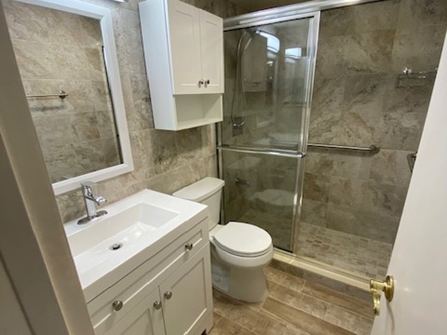 Vanity area after plumbing remodel by Fontana Plumbing