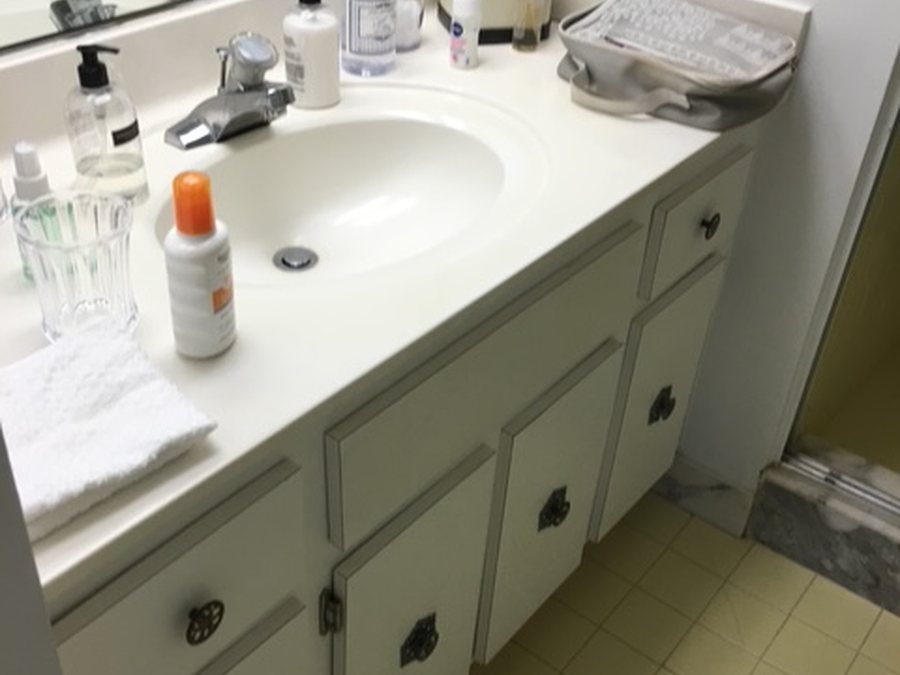 Vanity area before plumbing remodel by Fontana Plumbing